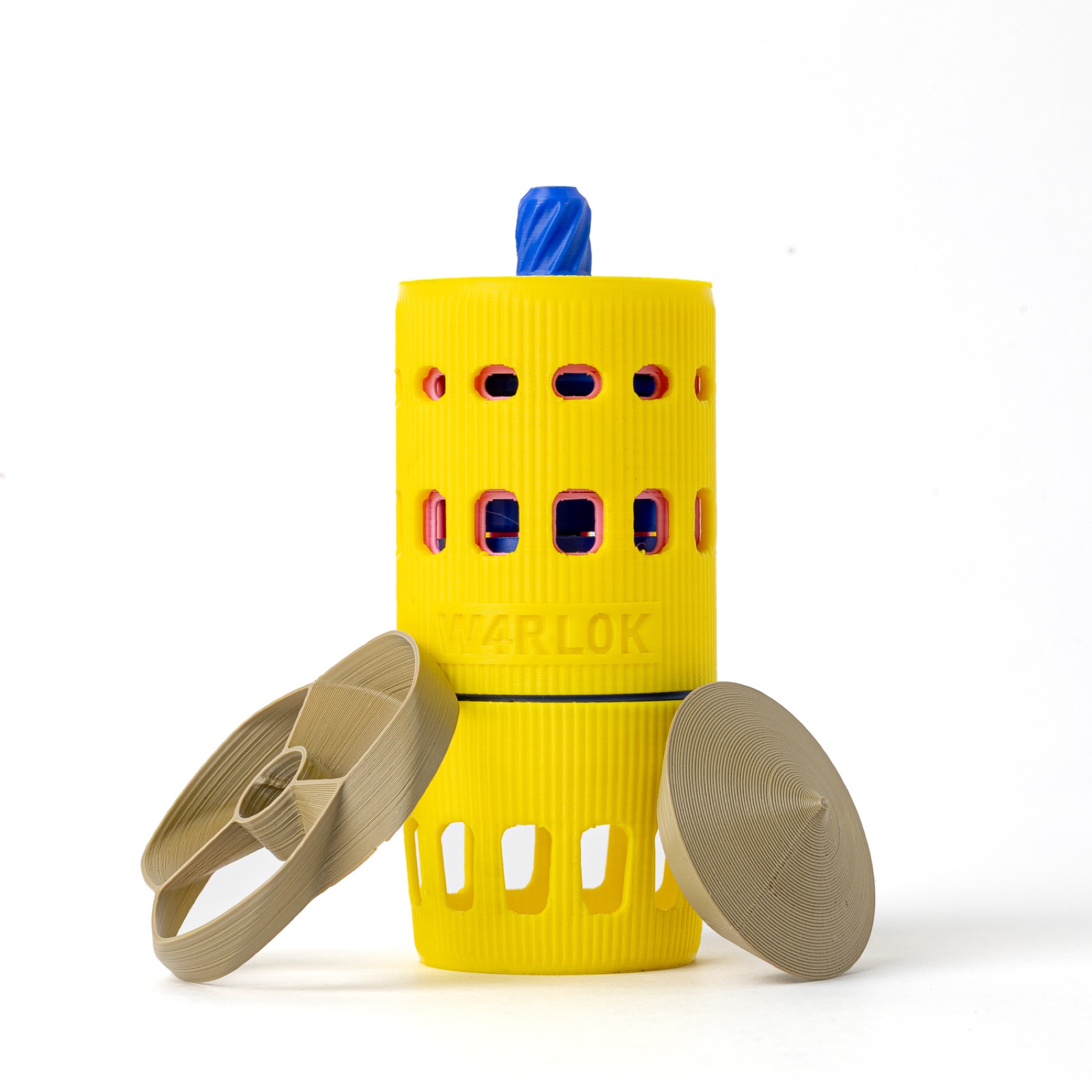 3D-printed planetary gear launcher toy assembled and ready to use, showing the colourful PLA gearbox body and detachable propeller on a white surface.